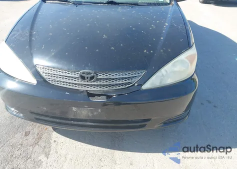 2002 Toyota Camry Le z USA, uszkodzony, nr VIN 4T1BE32K62U017256